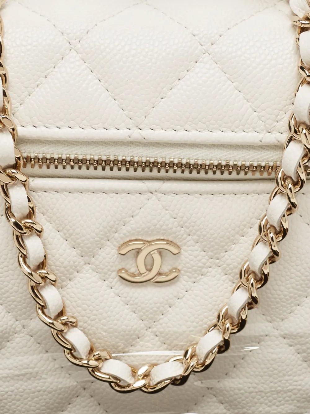quilted leather top-handle vanity bag