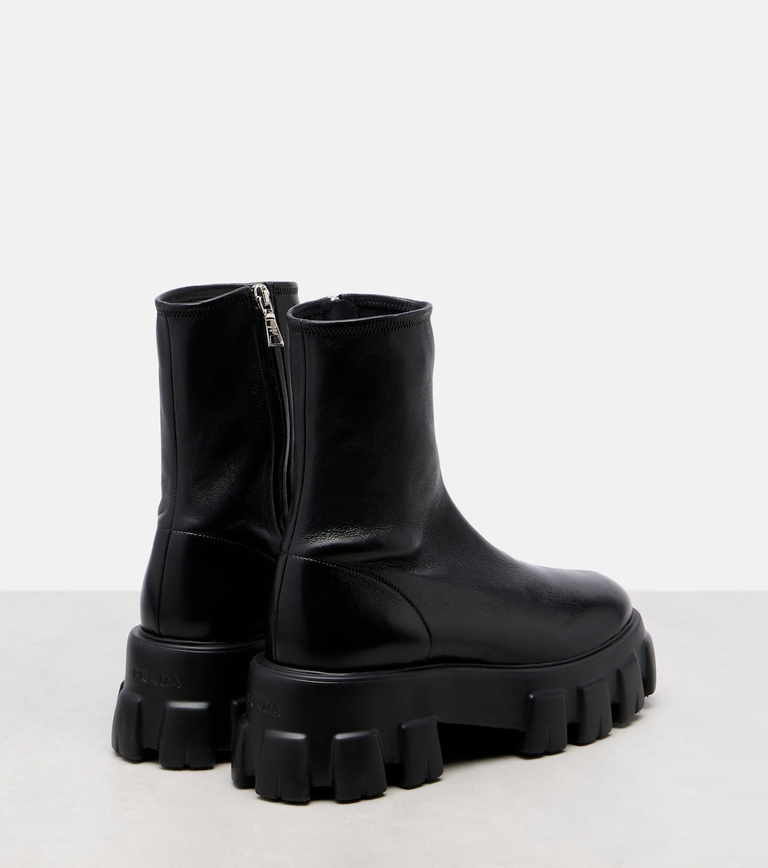 Prada Monolith Leather Ankle Boots – Black