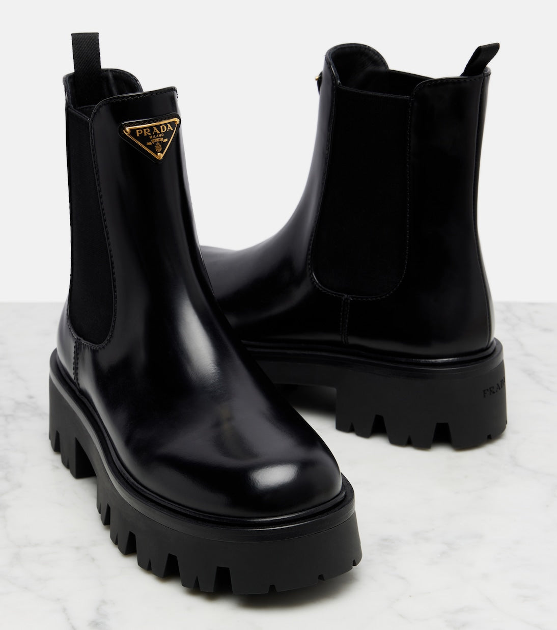 Prada Logo Leather Platform Chelsea Boots – Black