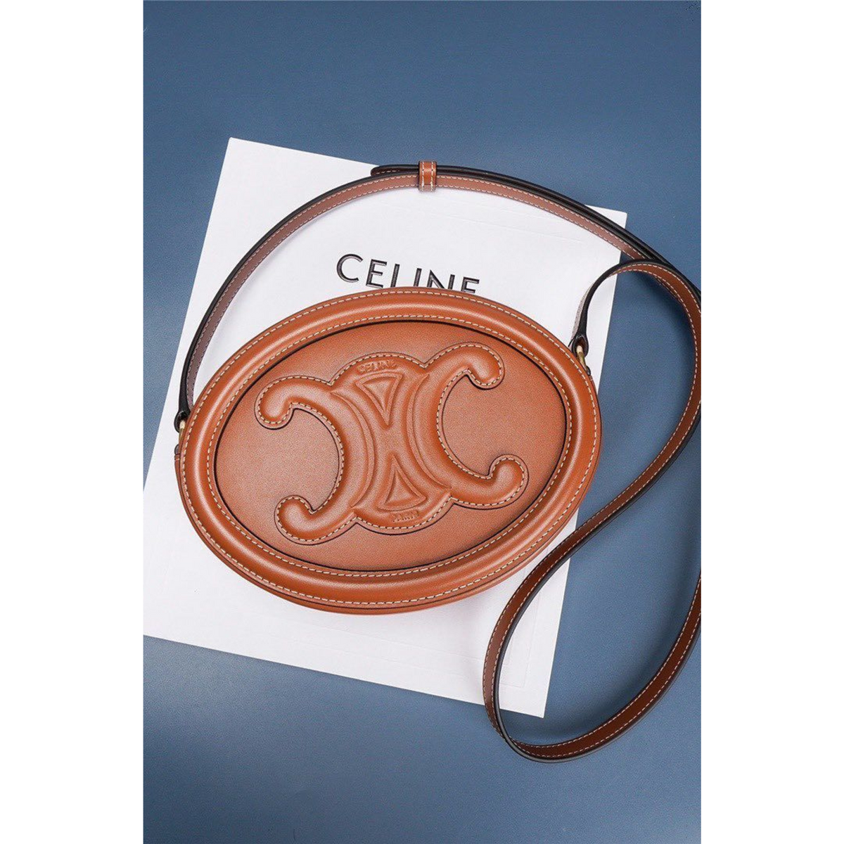 CROSSBODY OVAL PURSE CUIR TRIOMPHE